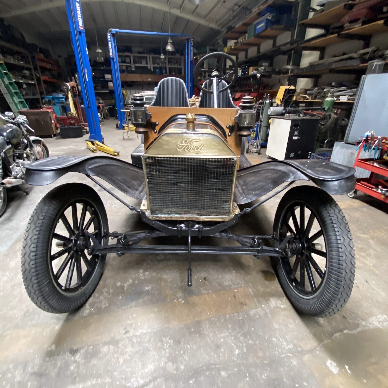 The General T, the finished 1911 Ford Model T, head-on with its brass Ford radiator and hand crank